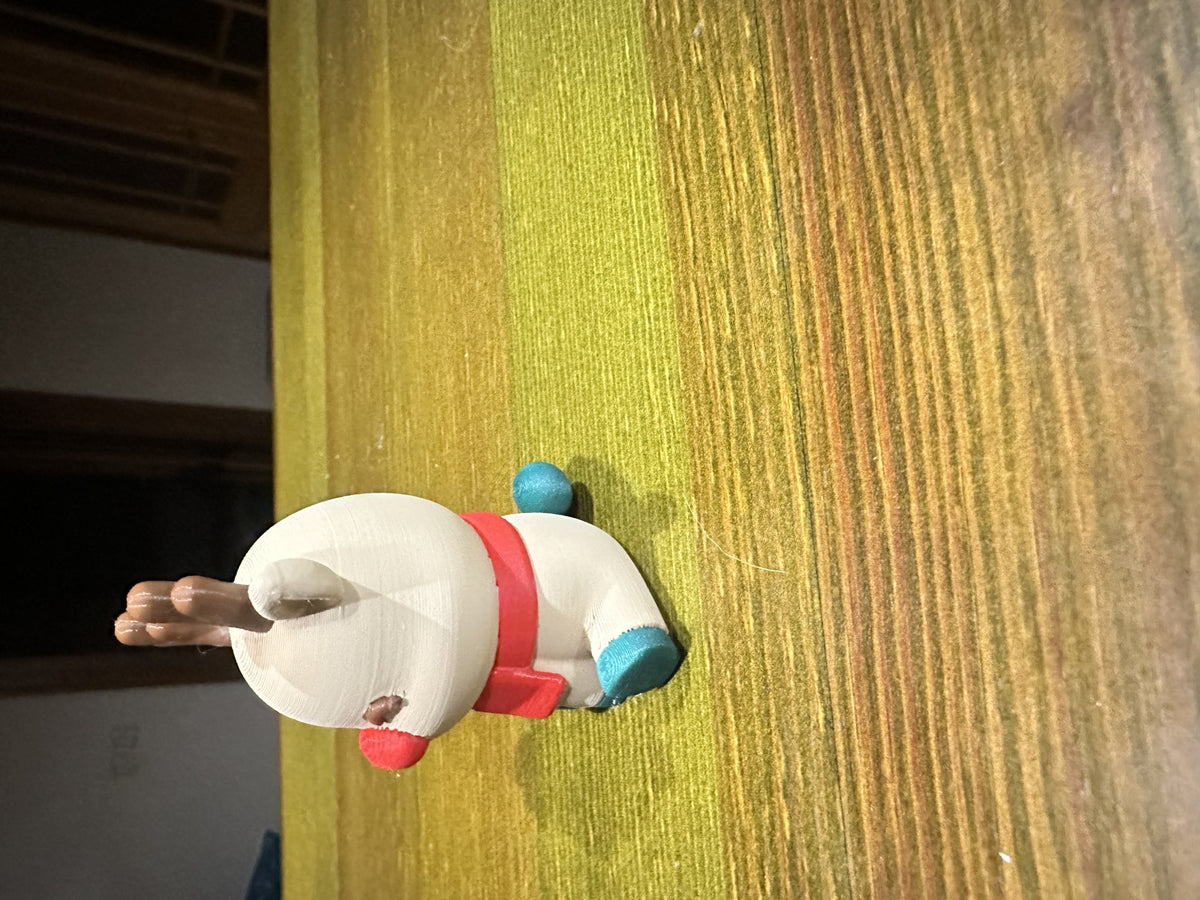 Cute reindeer with a red nose and scarf