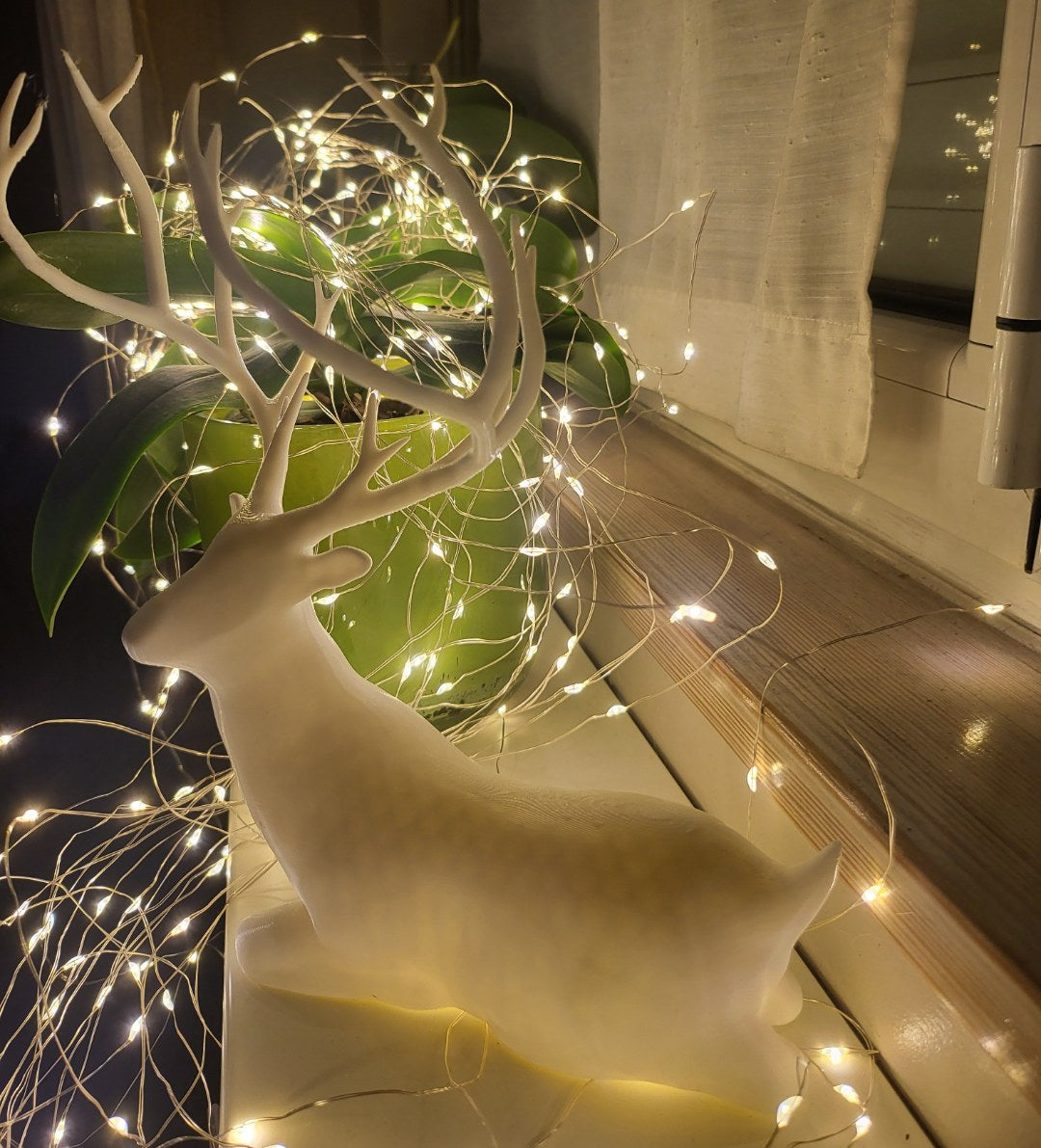 Sitting reindeer figure, Christmas decoration