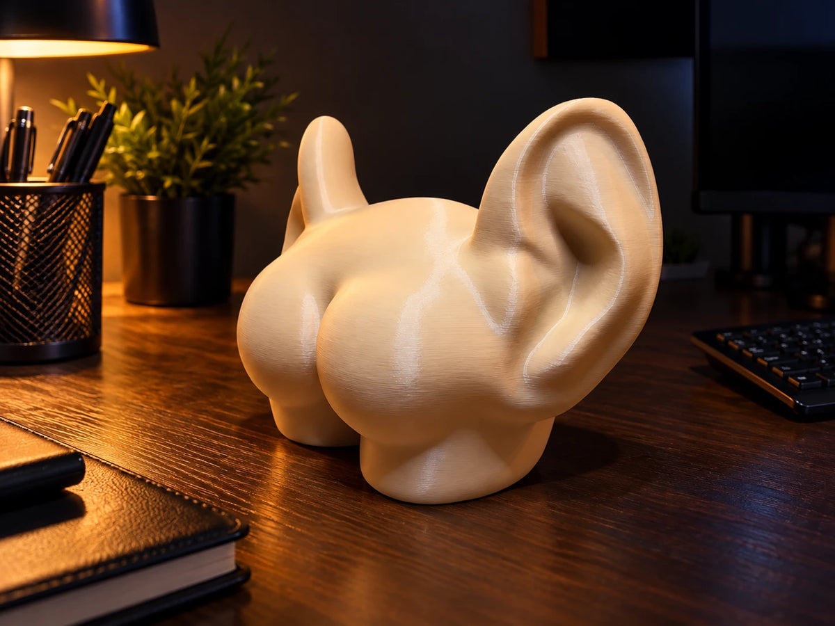 Butt with ears decorative figure seen from the side on a desk