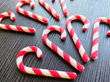 Eight two-coloured candy canes for the Christmas tree