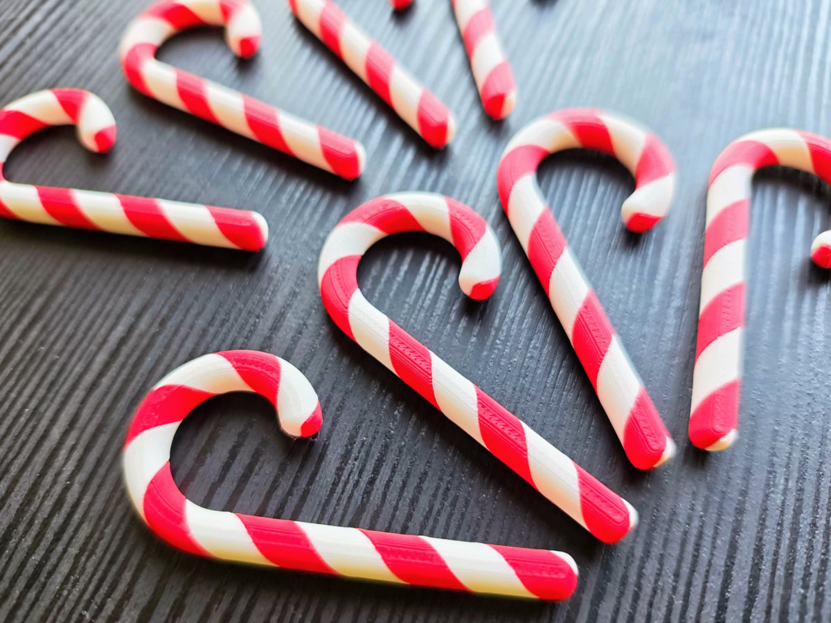 Eight two-coloured candy canes for the Christmas tree