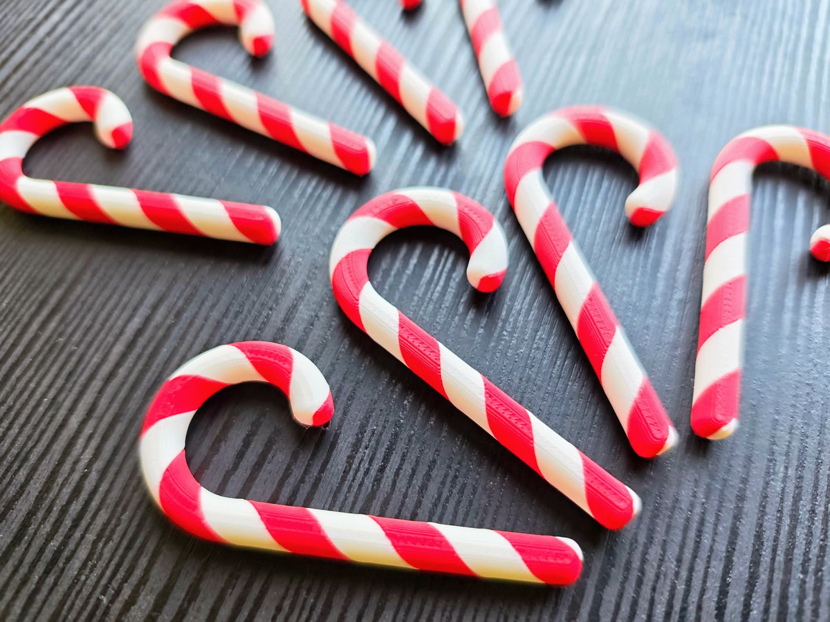 Eight two-coloured candy canes for the Christmas tree