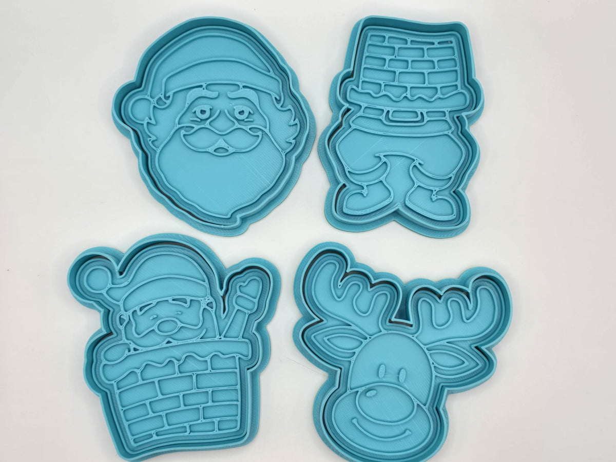 Cookie cutters with Santa Claus and reindeer