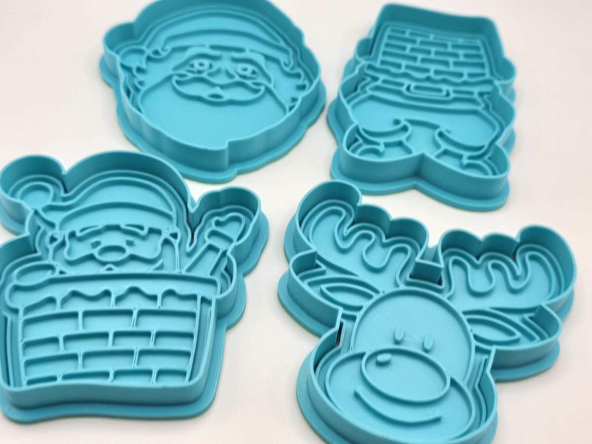 Cookie cutters with Santa Claus and reindeer