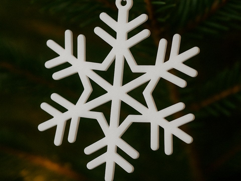 Detailed snowflake ornament with hanging hole