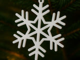 Detailed snowflake ornament with hanging hole