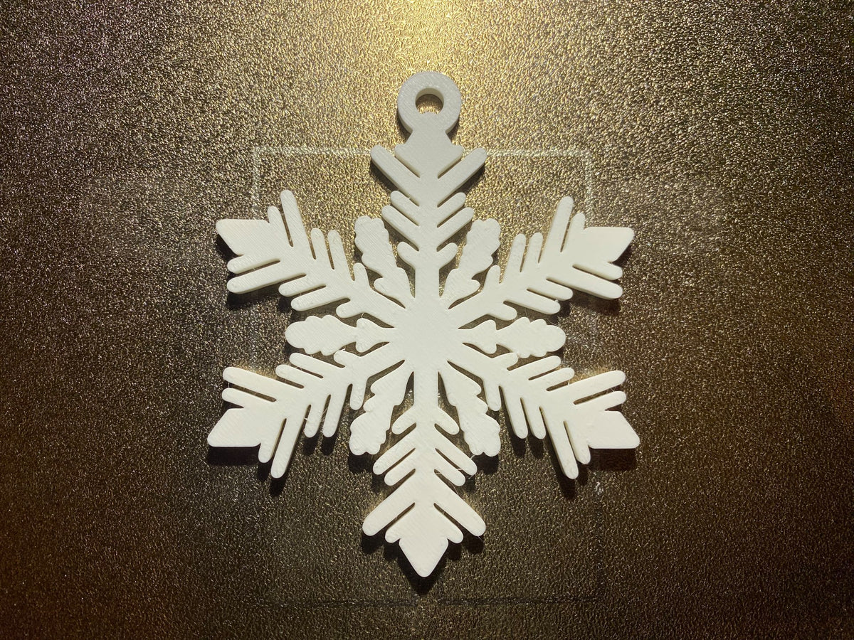 Six-armed snowflake with hanging loop