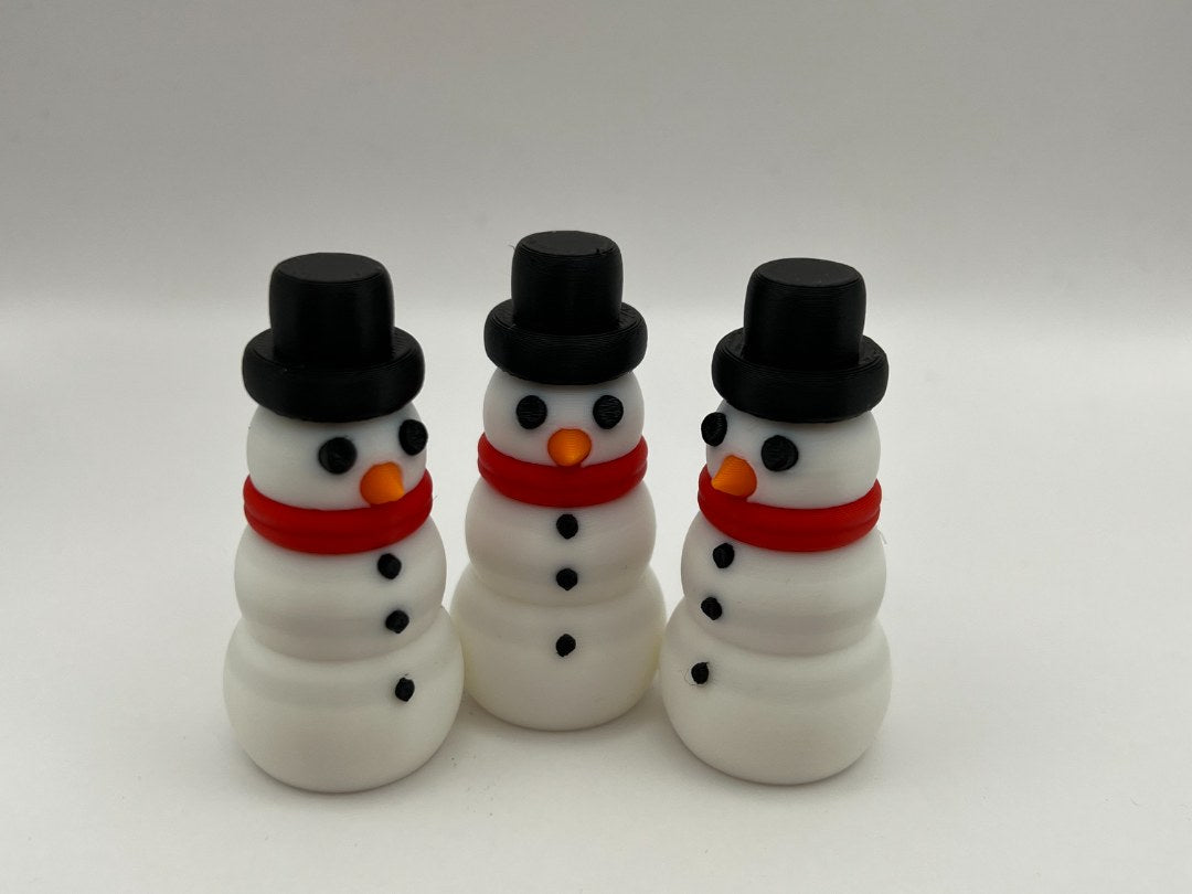 Small snowman figure in several colours