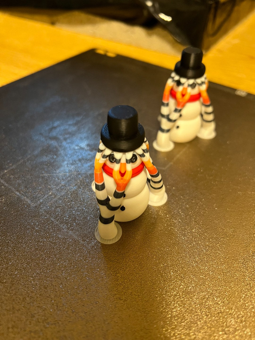 Small snowman figure in several colours