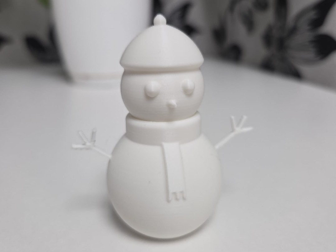 Minimalist smiling snowman figure