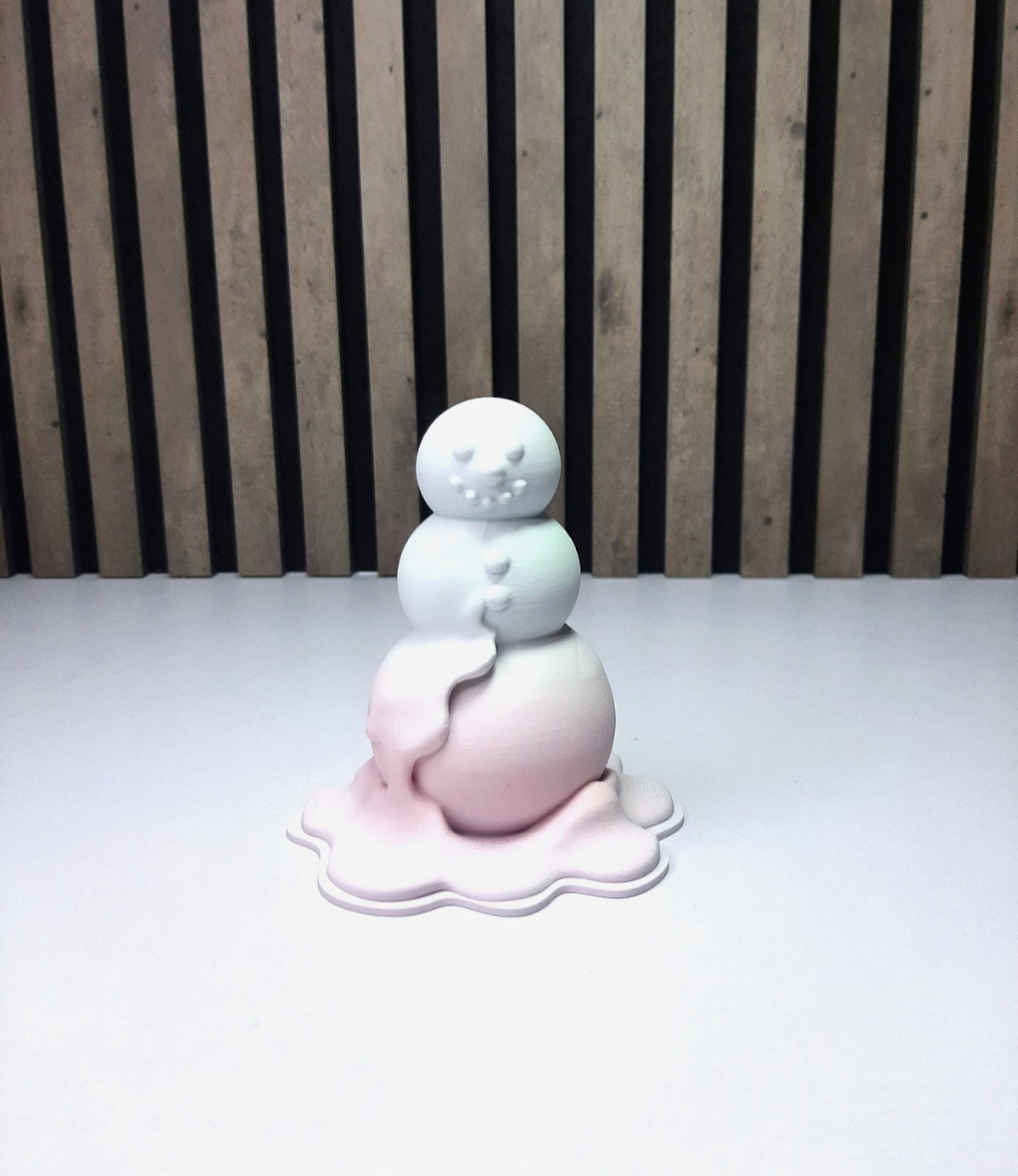 Modern figure of a melting snowman