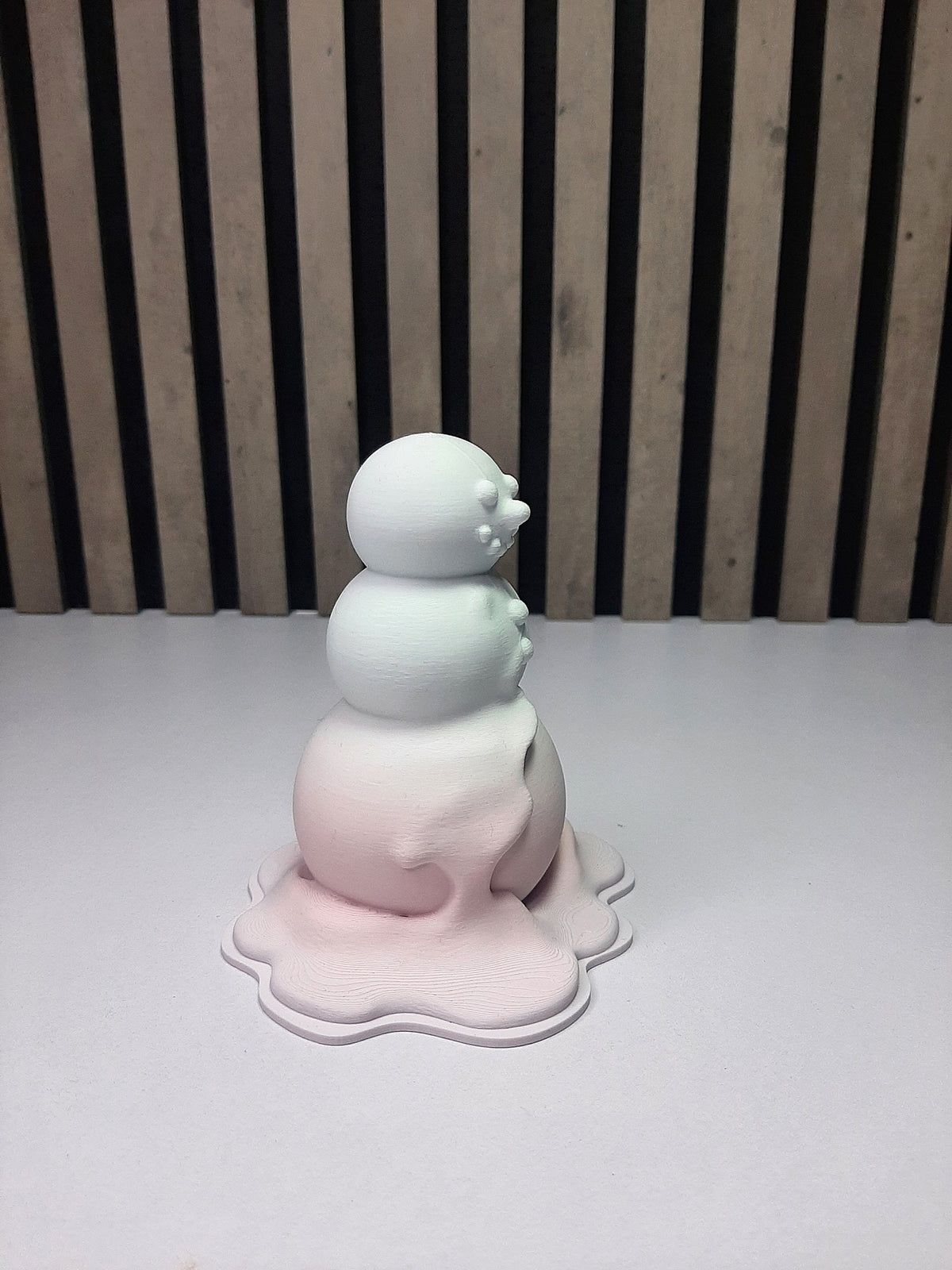 Modern figure of a melting snowman