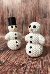 Cute snowman figure with a knitted look