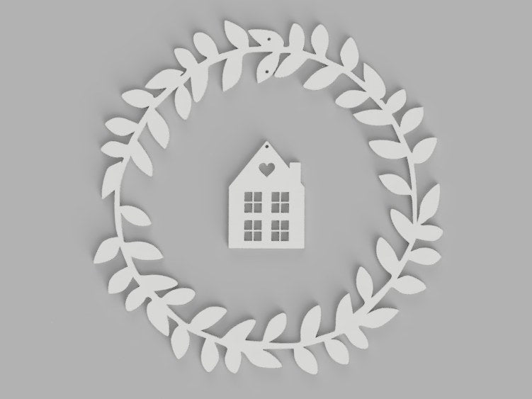Window wreath with a hanging house and heart